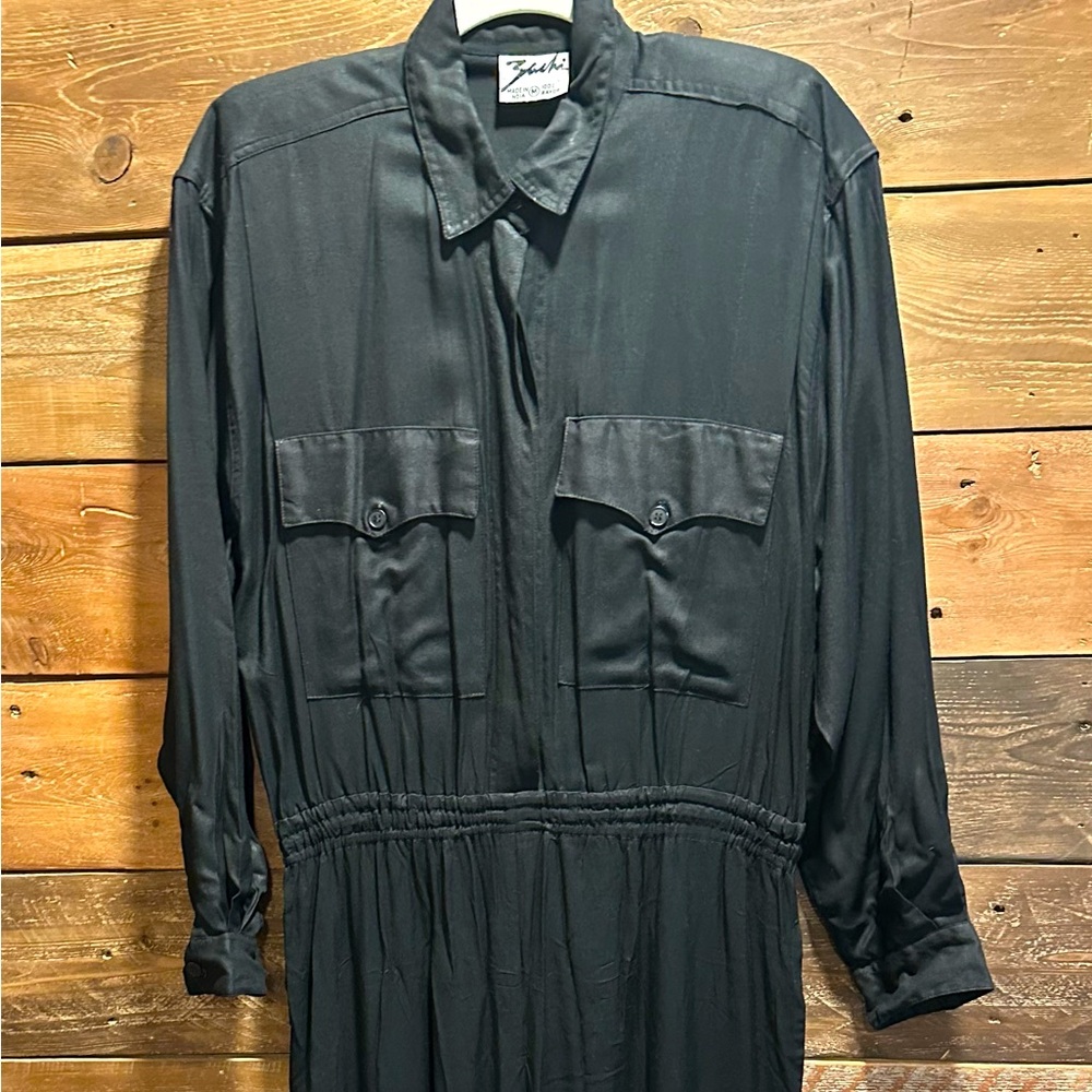 Unique 80’s vintage jumpsuit. Great with heals or casual with sneakers!